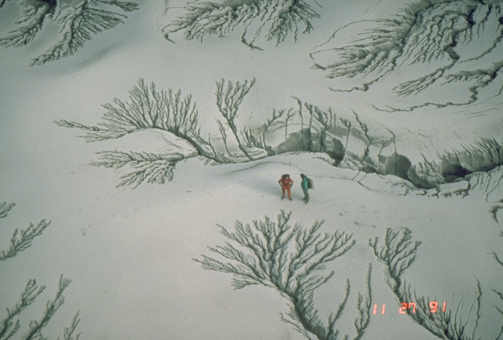 The unconsolidated pyroclastic flow and ash deposits emplaced during the June 1991 eruption of Pinatubo were remobilized by rain water as lahars for years after activity ceased. This photo shows erosion patterns in the deposits along the Maraunot River valley NW of Pinatubo on 27 November 1991. Photo by Chris Newhall, 1991 (U.S. Geological Survey).