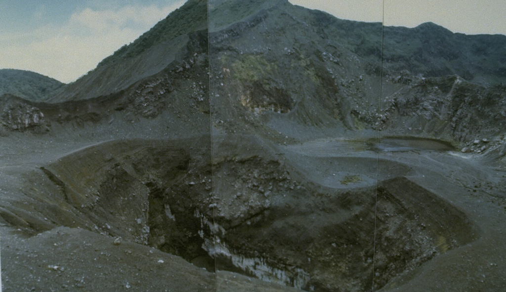 Kaba is a low, elongated volcano with a summit containing three historically active craters that decrease in size towards the ENE. The central crater seen in this photo has been the source of most historical eruptions, along with two other craters that have also been active. Small lakes have formed in all craters at various times. Photo by Deddy Rochendi, 1981 (Volcanological Survey of Indonesia).