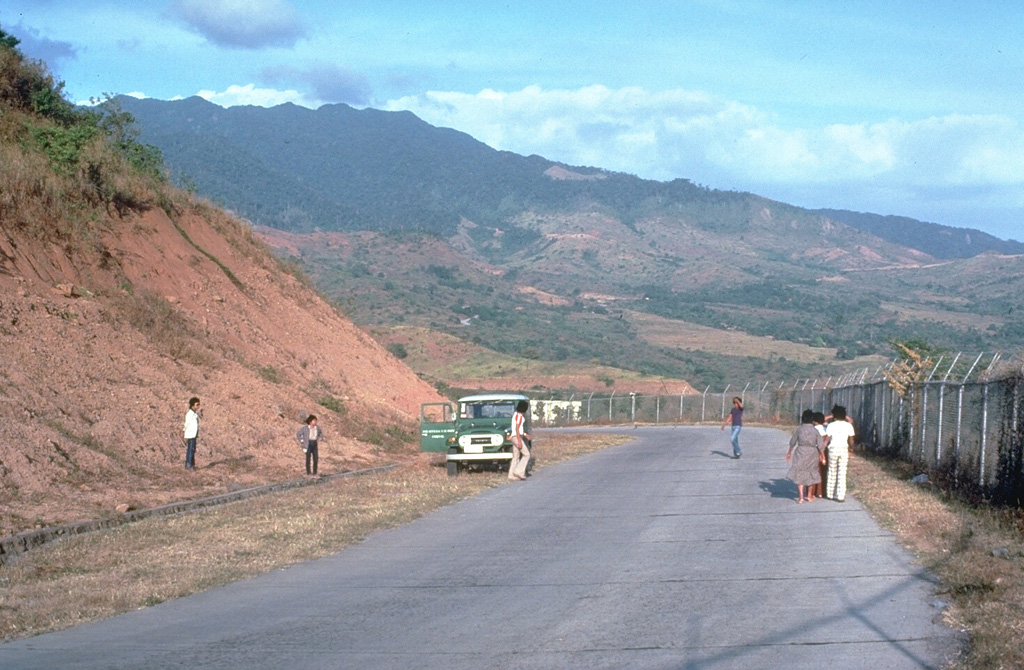 Mount Natib is located at the northern end of the Bataan Peninsula, S of Pinatubo. The summit of the volcano, seen here from the WNW, is truncated by a 6 x 7 km caldera. The age of the latest eruption is not known, but is considered to be late Pleistocene or Holocene. Five thermal areas are found in the summit region. Photo by Chris Newhall, 1989 (U.S. Geological Survey).