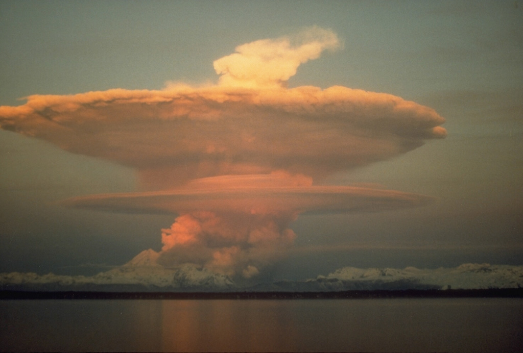 An ash plume from the pyroclastic flow descending the N flank of Redoubt volcano on 21 April 1990. The ash plumes produced during the 1989-1990 eruption damaged five commercial jet liners, with an incident on 15 December 1989 causing a Boeing 747-400 aircraft to temporarily lose power of all four engines. Photo by Joyce Warren, 1990 (courtesy of U.S. Geological Survey).