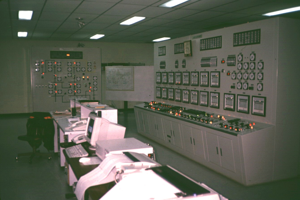 Electrical power from the Miravalles geothermal plant is distributed from the control room of Project CORTEZ.  The Miravalles I and II wells produce 60 and 55 MW of power, respectively, through reinjection.  The vapor-phase Miravalles III well is expected to produce 27.5 MW.  The depths of the geothermal wells vary from 959 to 3022 m. Photo by Guillermo Alvarado (Instituto Costarricense de Electricidad).