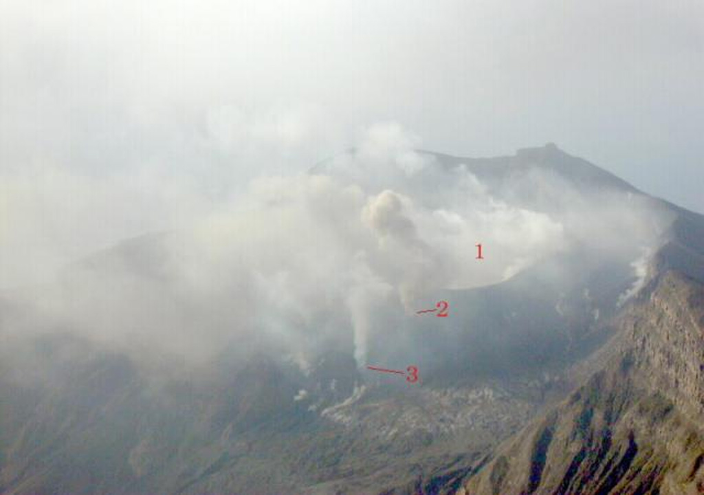 This photo of the NE slope of Suwanosejima was taken on 20 December 2000, the day after the onset of an explosive eruption. It shows the main active crater, Ontake (labeled 1), and two subsidiary craters (2 and 3). Explosive activity continued intermittently until July 2004. Photo by Kazuhiro Ishihara, 2000 (Sakura-jima Volcano Research Center).