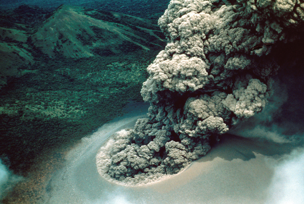 An ash plume rises above Cerro Negro on July 24, 1947.  A strong explosive eruption beginning on July 9 produced ashfall that damaged crops at Malpaisillo and prompted evacuations of towns west of the volcano.  Ash fell to the Pacific coast and to 7 inches on the roof of the cathedral at Leon.  A NE-flank parasitic cone was formed and  lava flows were emitted from both summit and flank vents.  The eruption lasted until August 2, 1947. Photo by Ray Wilcox, 1947 (U.S. Geological Survey).