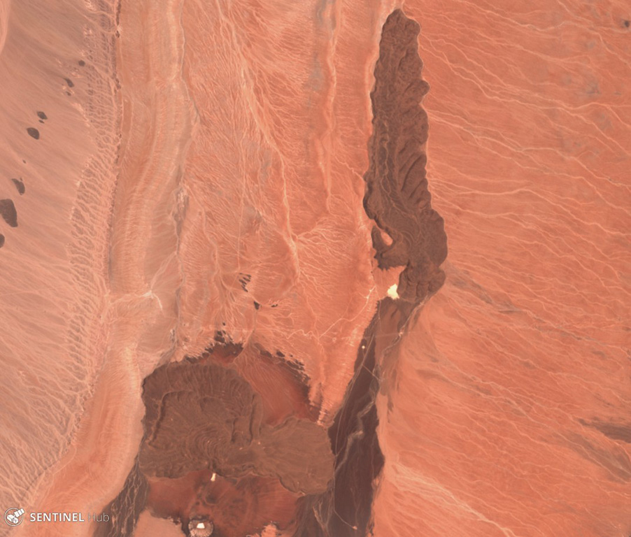 The Tilocalar volcanic center is shown here in this 25 November 2019 Sentinel-2 satellite image (N is at the top), with Tilocalar Norte near the center of the image and Tilocalar Sur to the SW. Tilocalar Norte erupted a single 4.3-km-long lava flow while Tilocalar Sur produced four lava flows. They overlie the Talabre ignimbrite. Satellite image courtesy of Copernicus Sentinel Data, 2019.