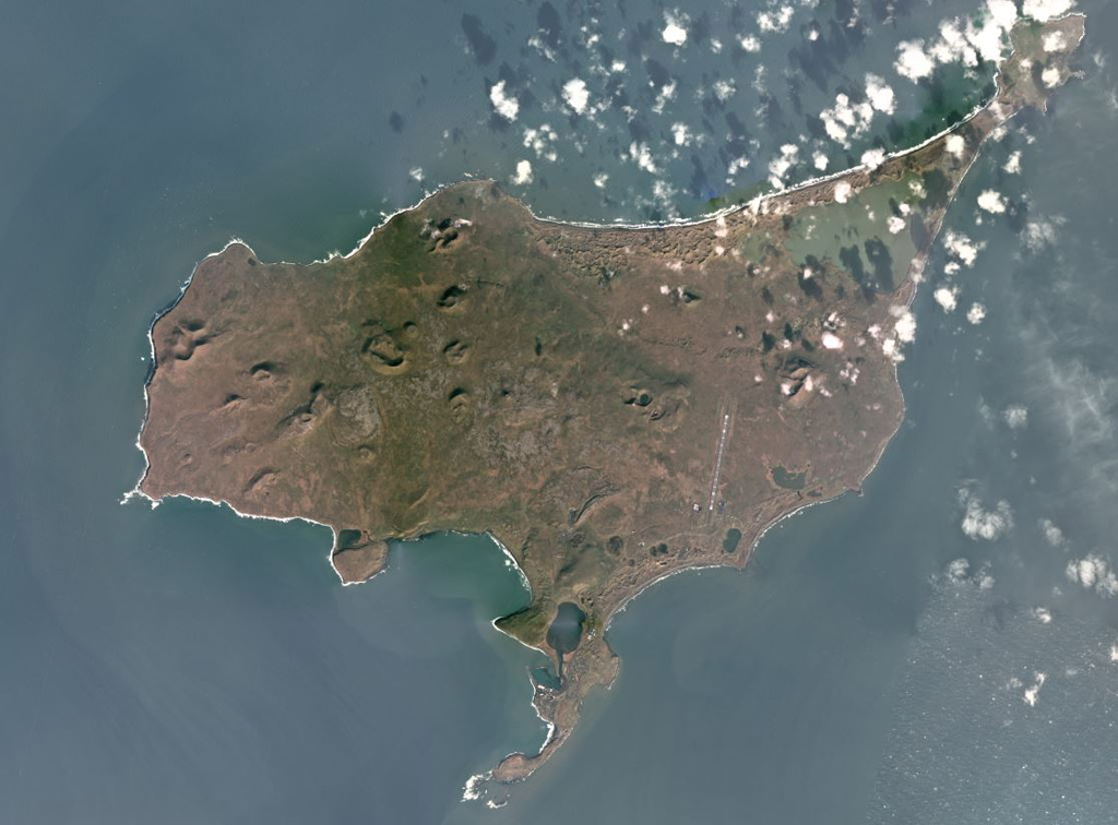 St. Paul island, one of the Pribilof Islands in the Bering Sea, is composed of overlapping scoria cones, spatter cones, and lava flows, shown in this October 2017 Planet Labs satellite image monthly mosaic (N is at the top; this image is approximately 23 km across). Cones include the westernmost Rush hill, Black Bluffs scoria cone on the southern peninsula, the Bogoslof Hill complex in the center, and North Hill along the northern coastline. Satellite image courtesy of Planet Labs Inc., 2017 (https://www.planet.com/).