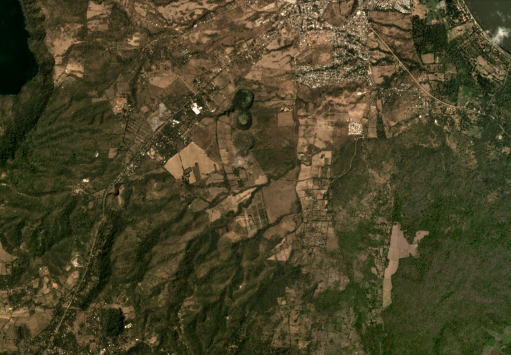 The Granada volcanic complex contains maars and scoria cones, with some shown in this February 2020 Planet Labs satellite image monthly mosaic (N is at the top; this image is approximately 9 km across). Near the center of this image is the N-S trending La Joya maar chain. SW of that are several scoria cones, one with a preserved crater and one with a quarry next to the road. Satellite image courtesy of Planet Labs Inc., 2020 (https://www.planet.com/).